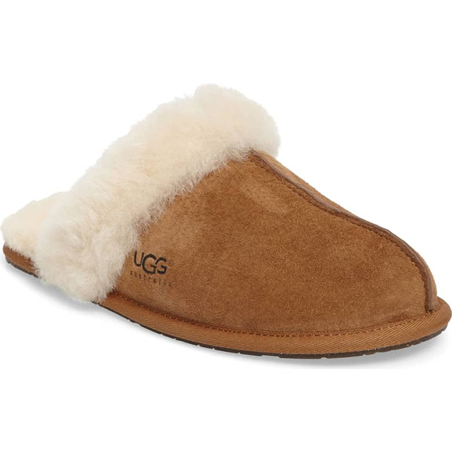 Ugg Schuffette II Slippers A brown water-resistant suede slipper is trimmed with white shearling.